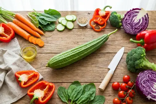 Luffa gourd with vitamin-rich foods showing nutritional value