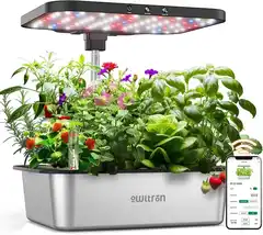 Owltron smart hydroponics growing system with 15 pods, LED grow lights illuminating fresh herbs and seedlings, stainless steel indoor garden on kitchen counter